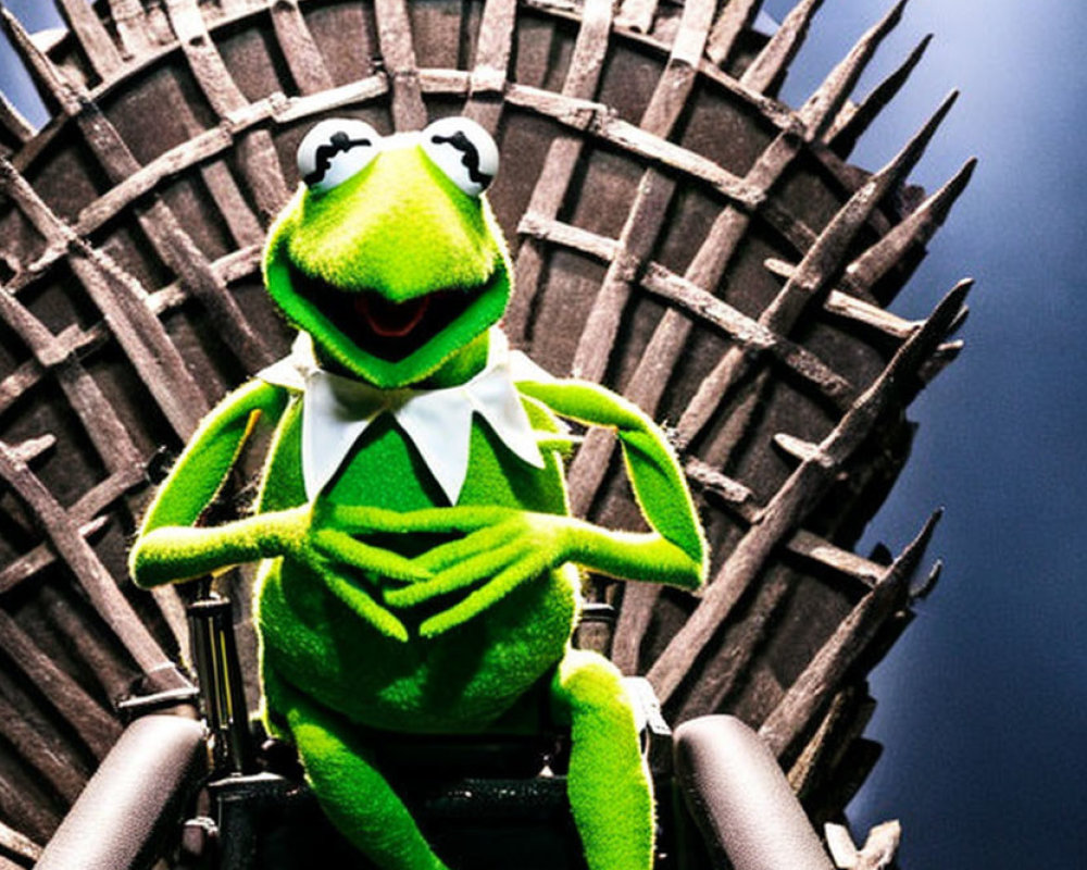 Plush Kermit the Frog on Iron Throne replica against dark background