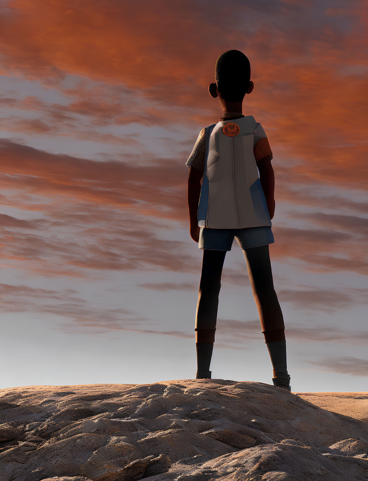 Young person on rocky outcrop gazes at fiery orange sky