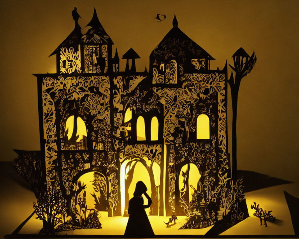 Detailed Paper Cut-Out Artwork of Castle Silhouette with Figure