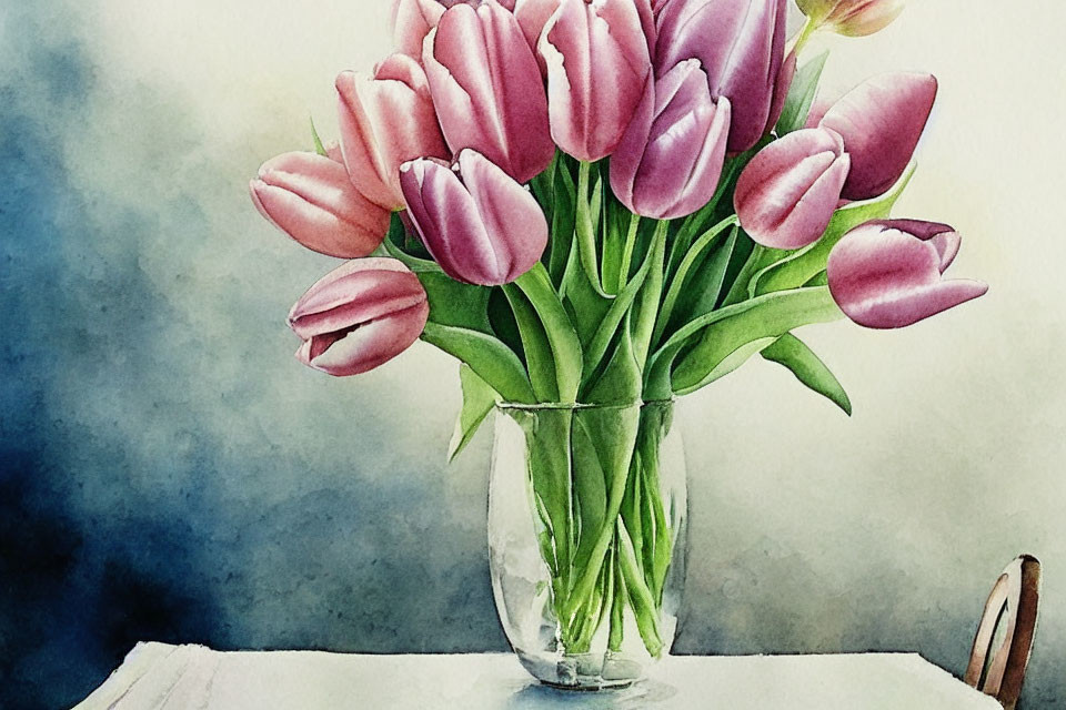 Pink tulips bouquet in glass vase against blue-grey background