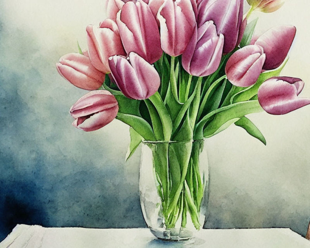 Pink tulips bouquet in glass vase against blue-grey background