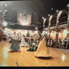 Vibrant dresses in traditional dance under sunlit skies