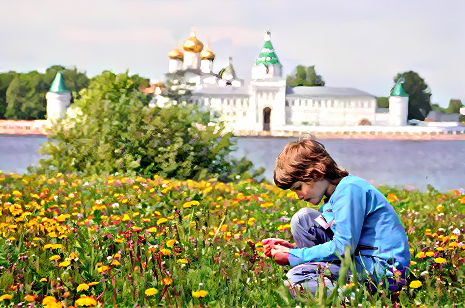 A boy on the lawn opposite the monastery.