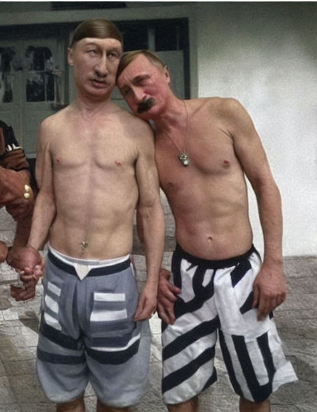 Two shirtless men in striped pants with matching facial hair, one with a mustache