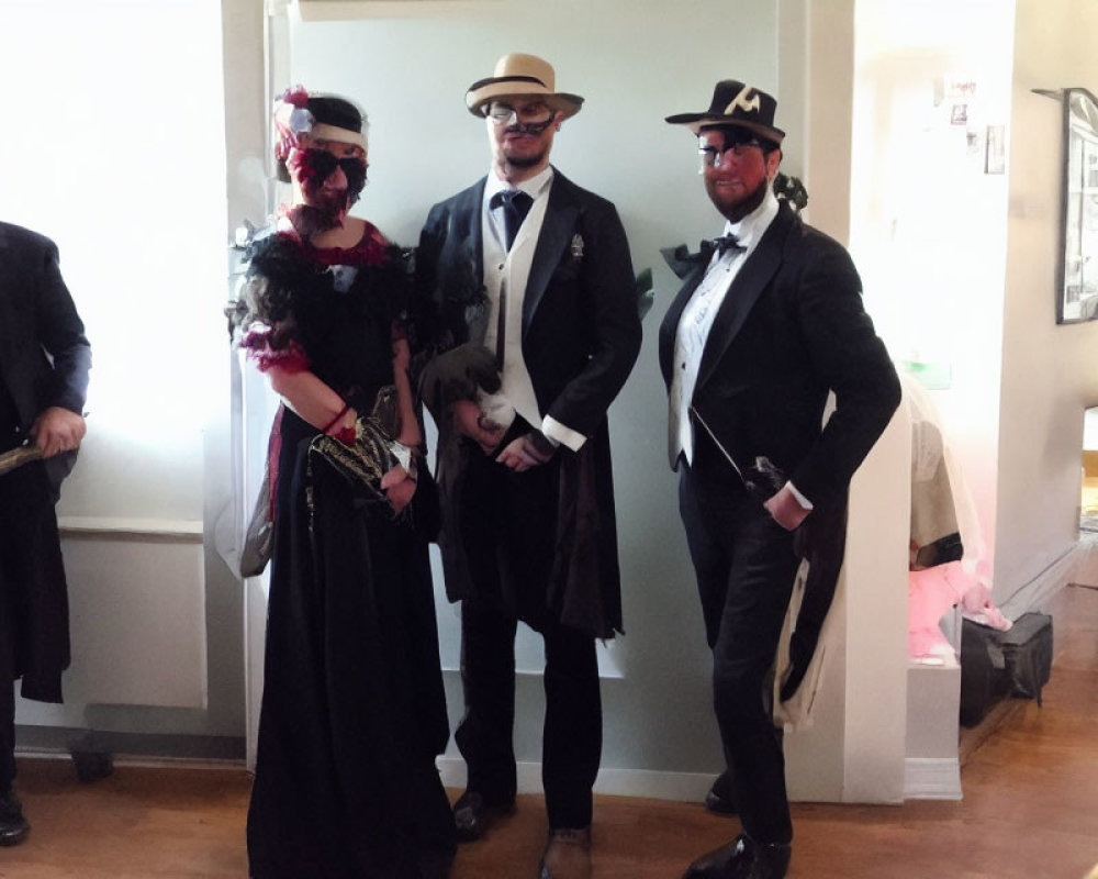 Three People in Vintage Costumes with Top Hats, Suits, and Feathered Mask Holding Small Dog