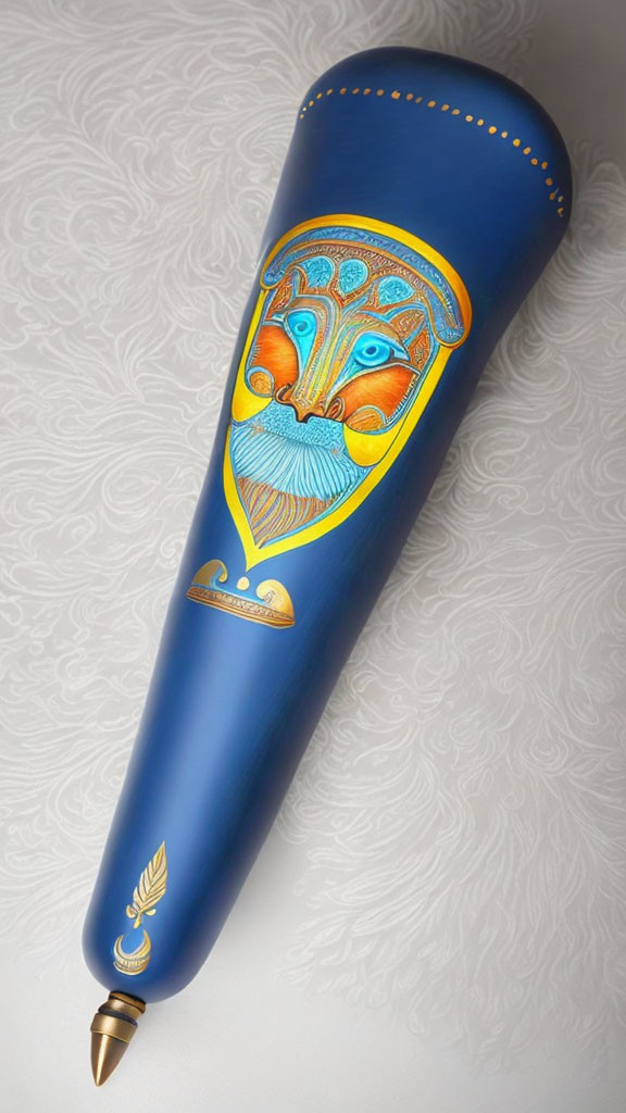 Blue Pen with Gold and Orange Lion Face Design on Textured Background