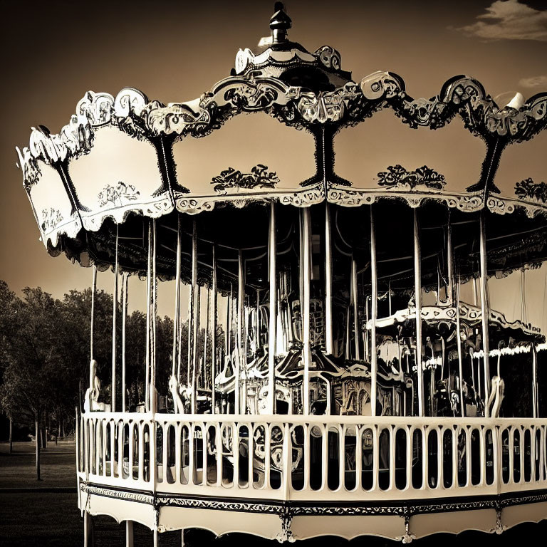 Vintage carousel with intricate designs in sepia tone.