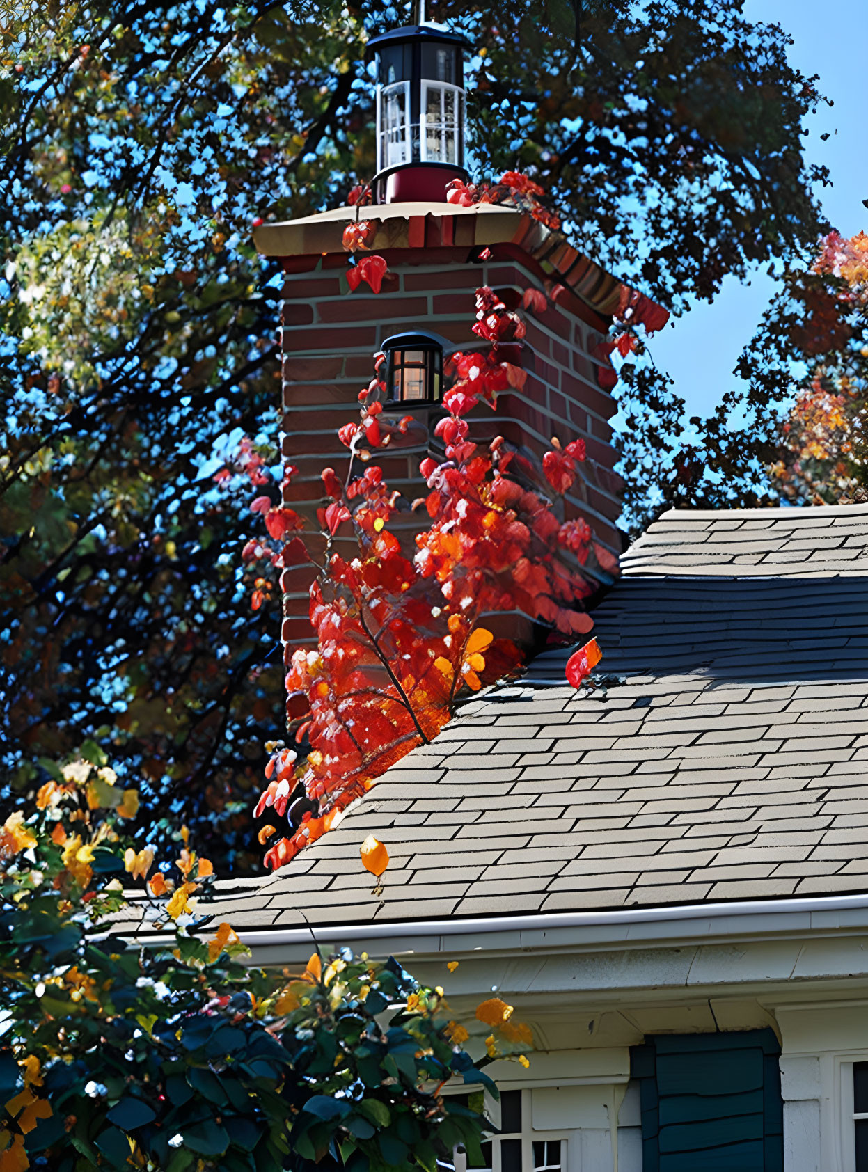 Autumn scene: Red and white lighthouse among colorful leaves.