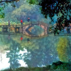 Traditional Attire Person on Pier by Tranquil Lake with Gazebo