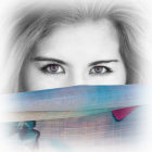 Vibrant portrait of a woman with striking eyes in colorful, blurred background