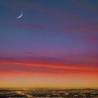 City skyline under crescent moon and colorful twilight sky.