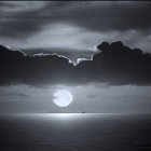 Full Moon Reflects on Tranquil Sea Amid Ominous Clouds