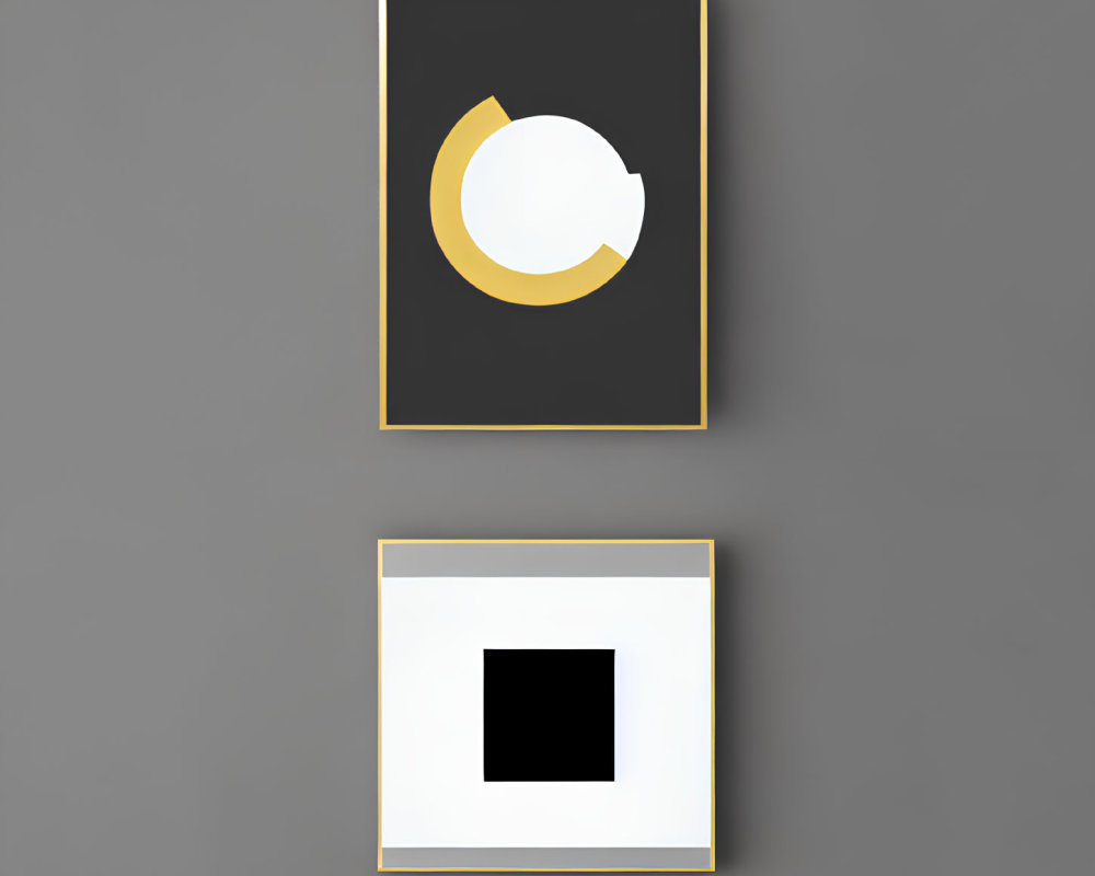 Abstract geometric paintings on gray wall: one with black shapes, the other featuring a white square.