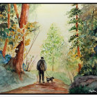 Elderly person walking in colorful autumn woods