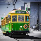 Festive green tram in snowy scene with Christmas decorations