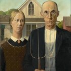 Elderly couple with stern expressions in front of house reminiscent of American Gothic
