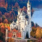 White Chateau Surrounded by Colorful Autumn Forest