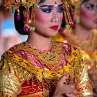 Colorful digital artwork: Two women with elaborate headdresses