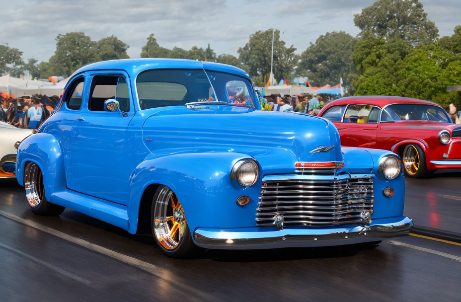 Bright Blue Customized Vintage Car with Chrome Details at Car Show