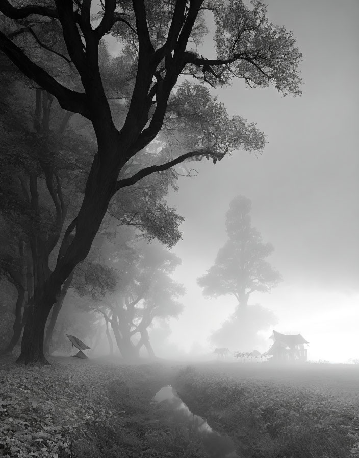 Monochromatic misty landscape with trees, stream, and traditional structures