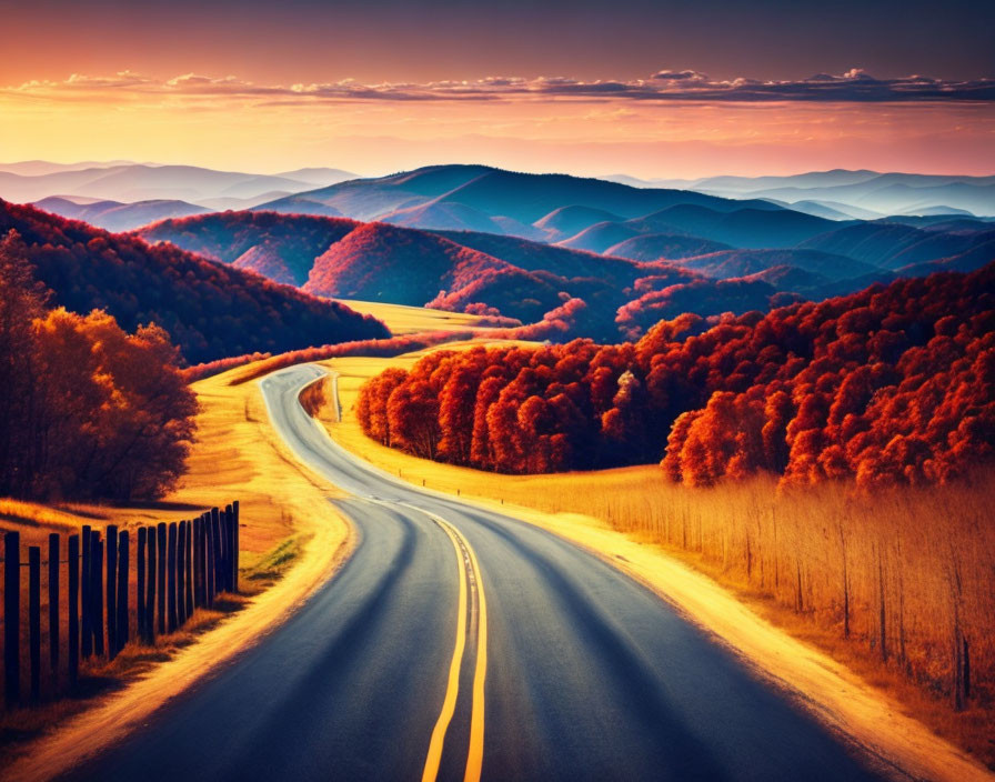 Winding road through vibrant autumn landscape with rolling hills