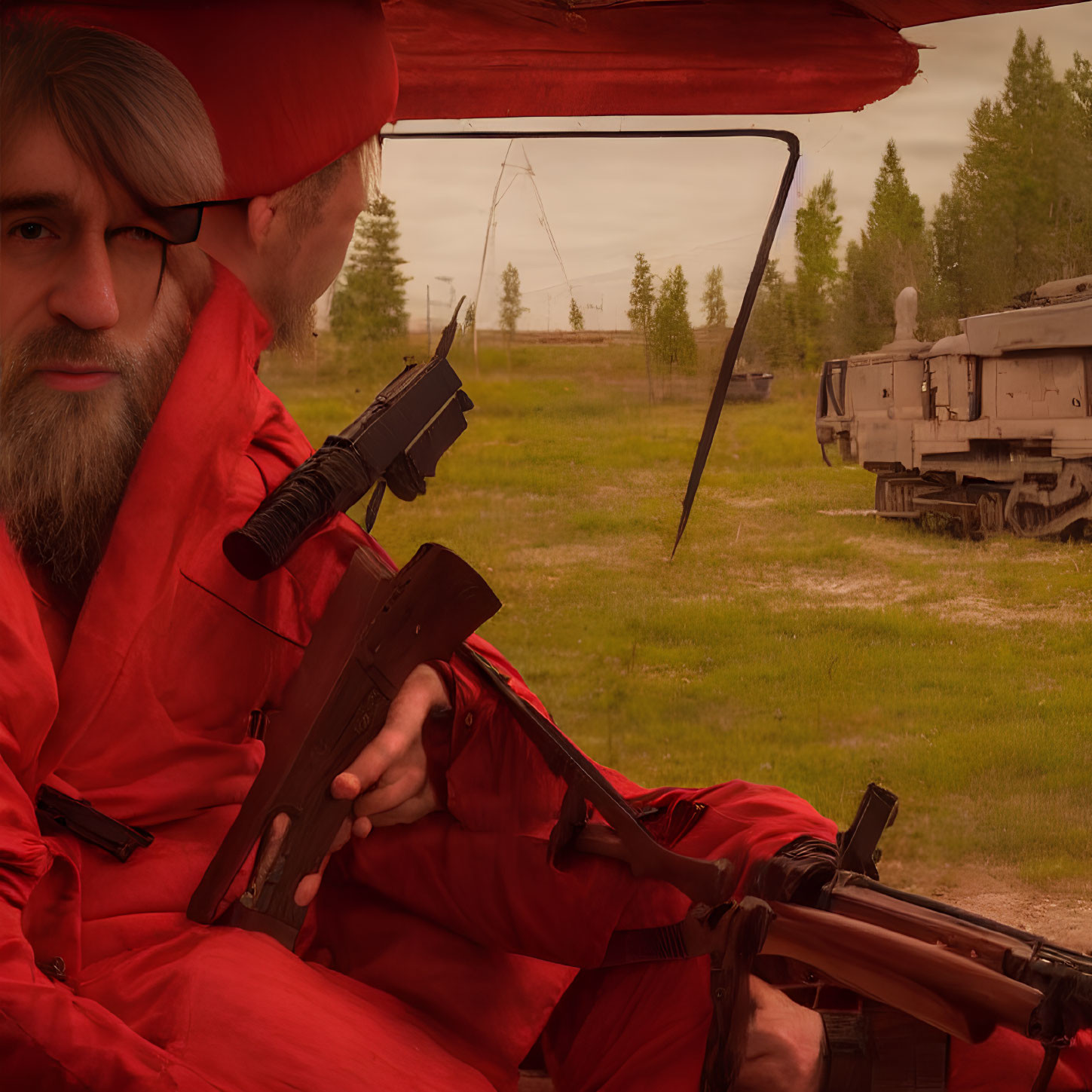 Two men in red outfits with rifles in military setting.