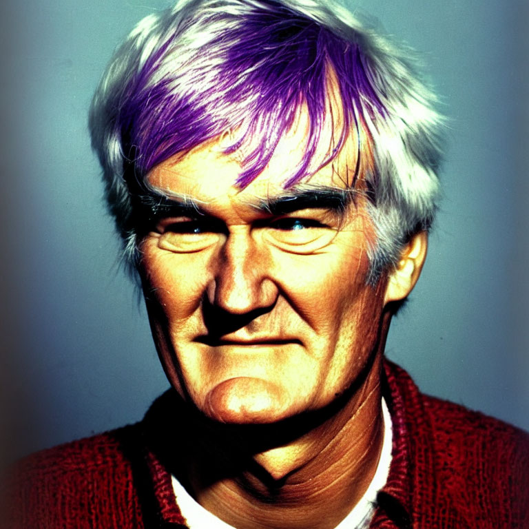 Purple-haired man in red sweater on blue background