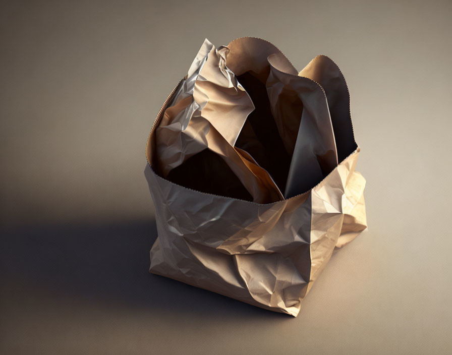 Crumpled Brown Paper Bag on Neutral Background