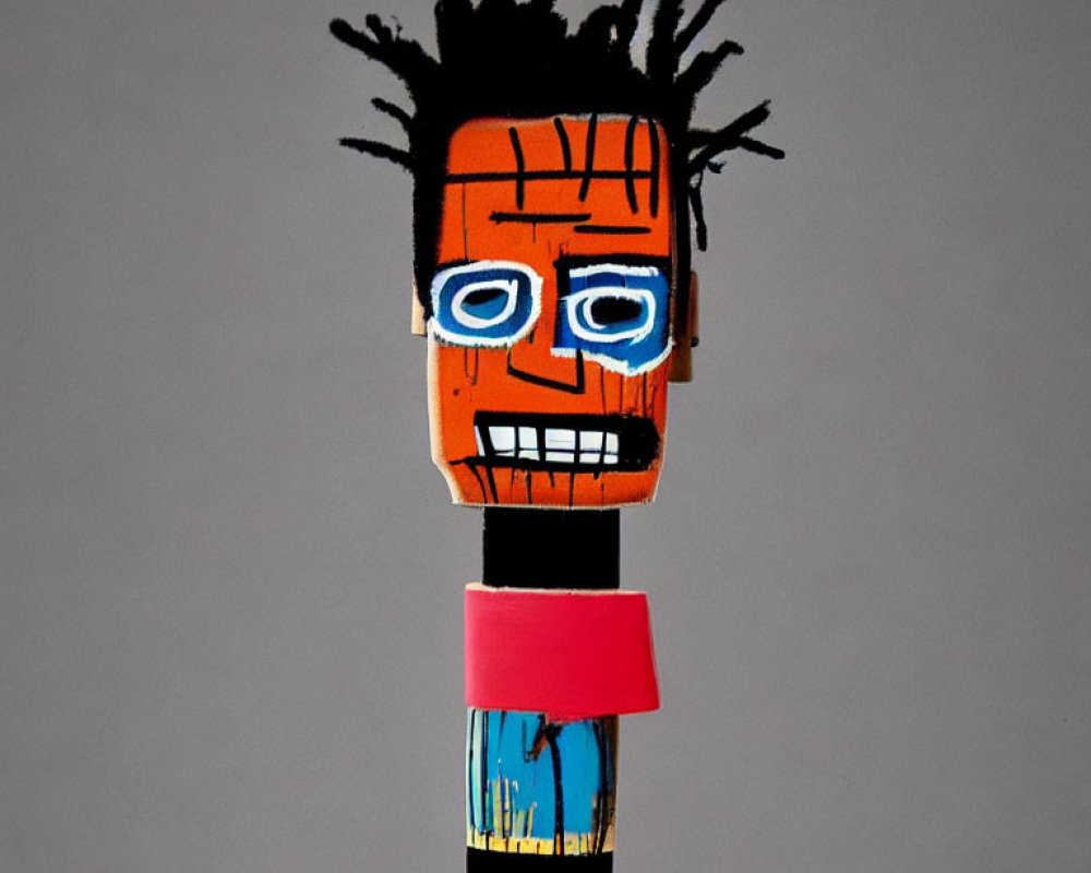 Colorful Wooden Figure with Black Spiky Hair and Blue Eyes