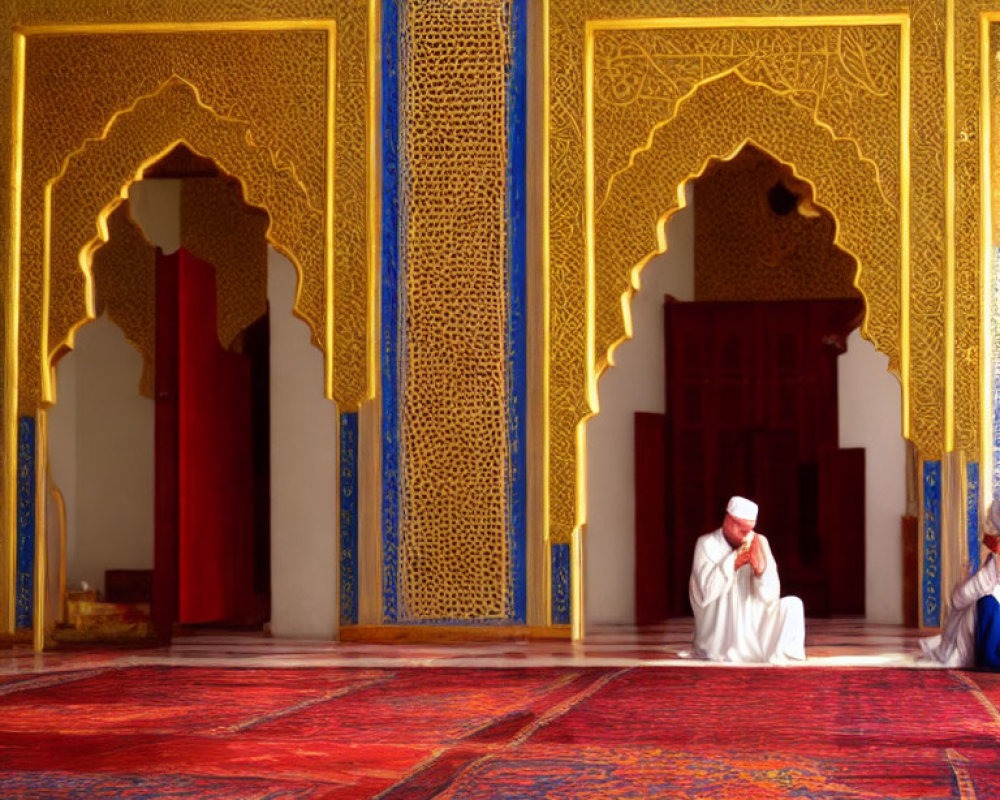 Traditional Attired Man on Patterned Carpet in Ornate Room