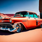 Vintage Orange Car with Chrome Details in Desert Landscape