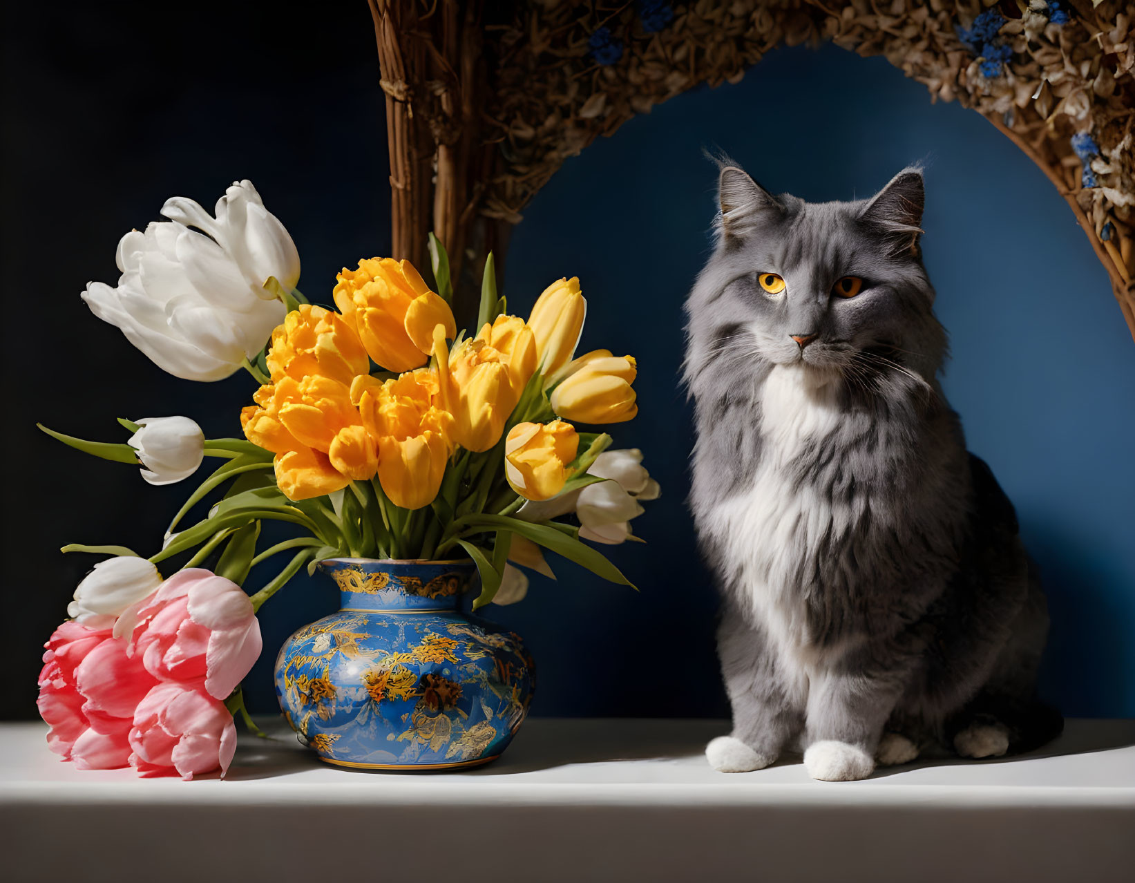 Grey Cat with Tulips and Blue Vase Next to Ornamental Arch