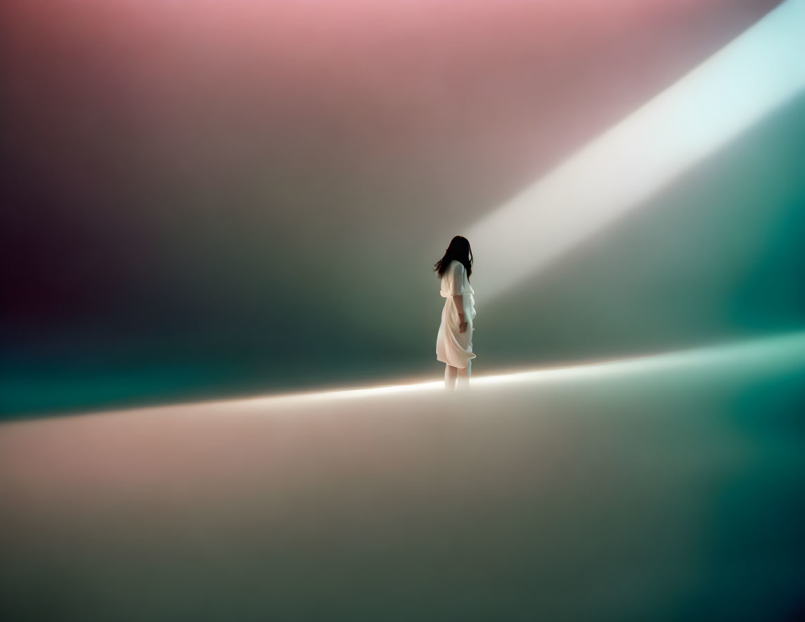 Silhouette of person in light beam amid dark and pastel gradient