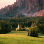 Sunlit Valley with Green Meadows, Small Church, and Towering Mountains