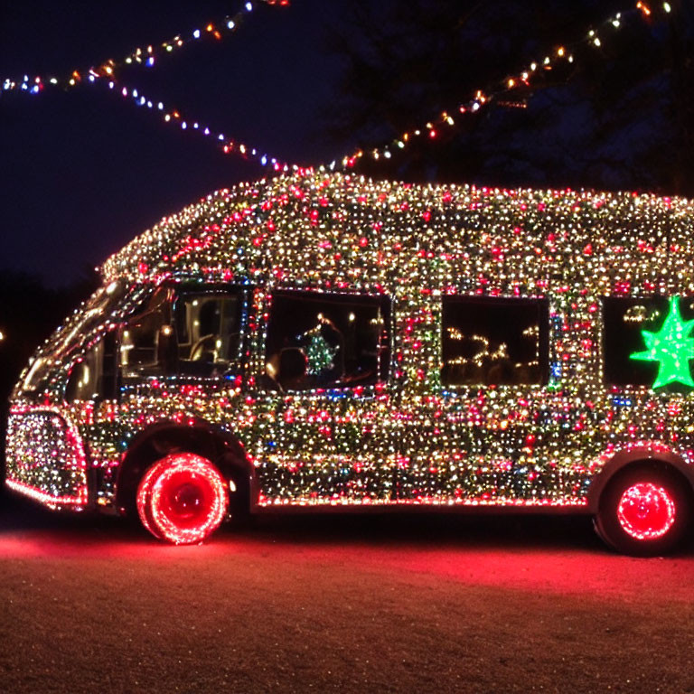 Colorful Christmas lights adorn bus under night sky with green star decoration