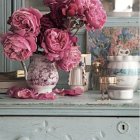 Vintage Floral Arrangement with Pink Peonies in Porcelain Vase on Pastel Blue Dresser