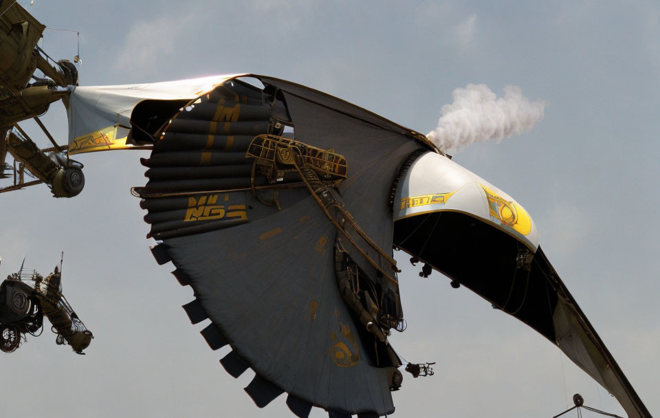 Mechanical bird wing emitting smoke with visible gears and hanging machines