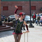 Steampunk-themed scene with vintage attire, goggles, classic cars, and industrial city backdrop