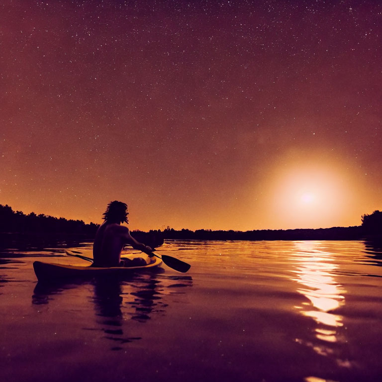 Person kayaking on tranquil lake under starry sky at glowing horizon