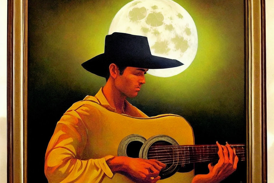 Man in Cowboy Hat Playing Guitar Under Full Moon