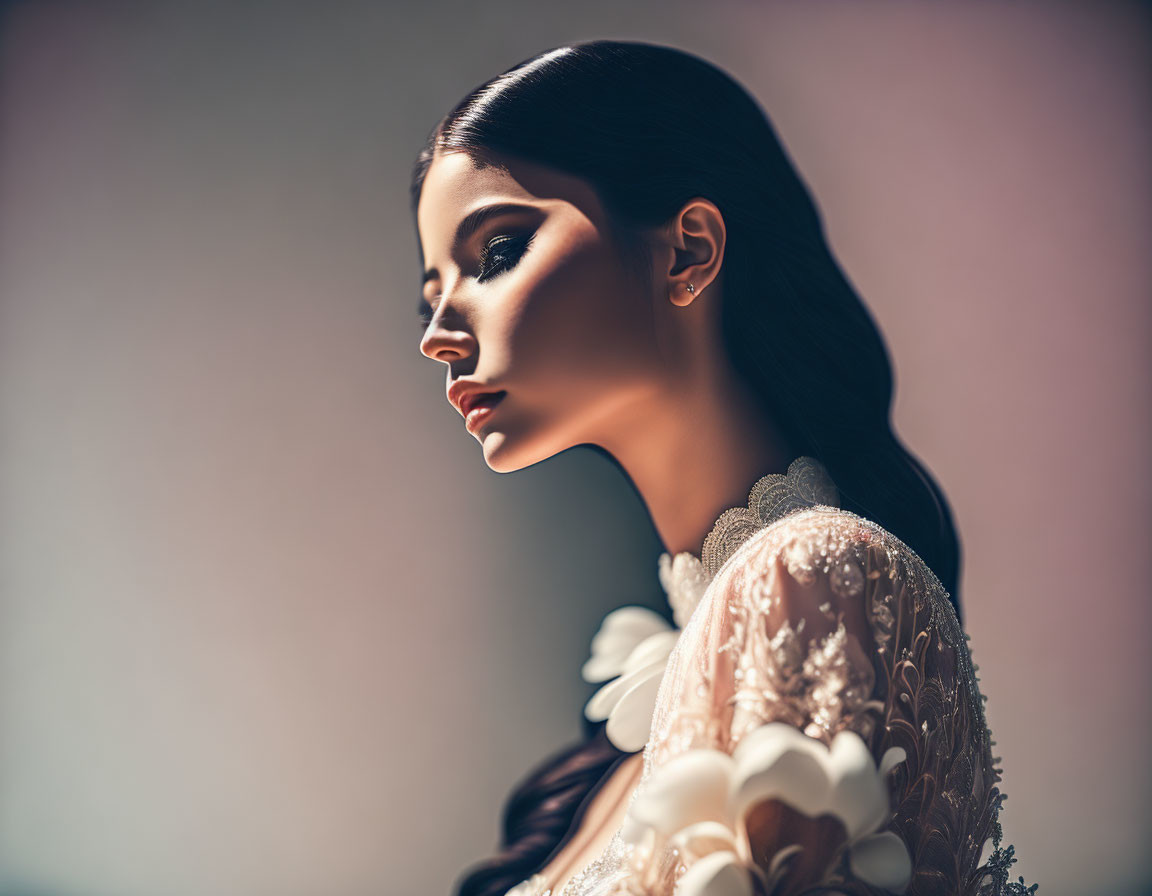 Profile of serene woman in white lace dress on gradient backdrop