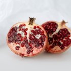 Realistic Watercolor Painting of Ripe Pomegranate