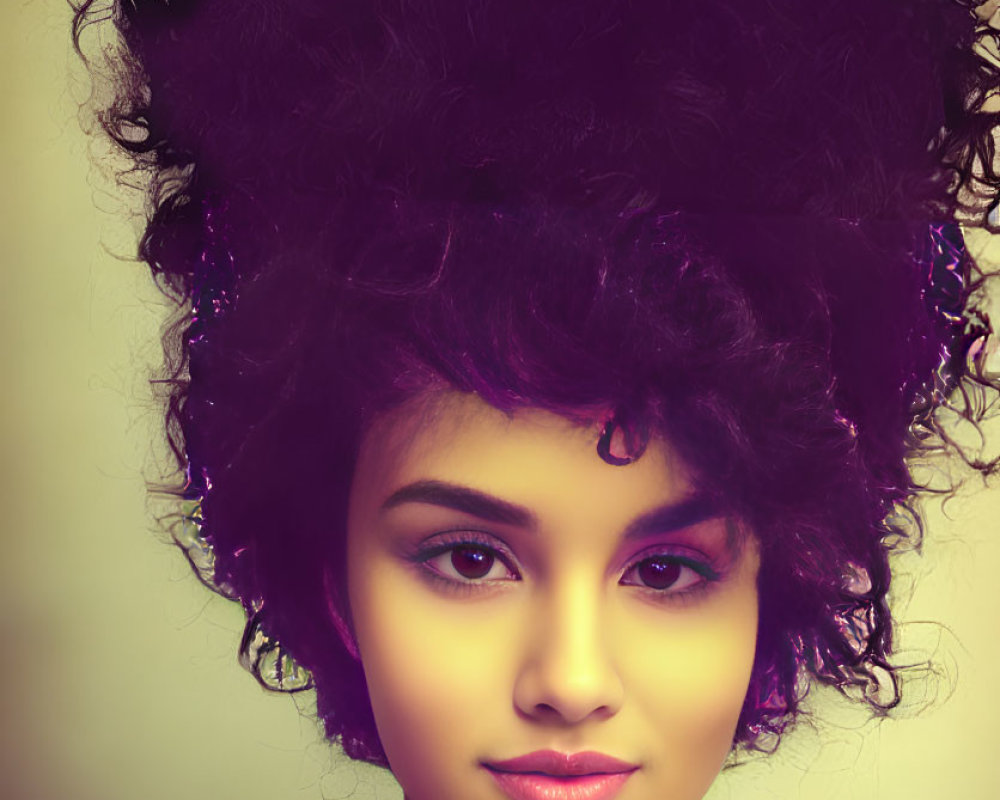 Curly-haired woman with subtle makeup on warm background