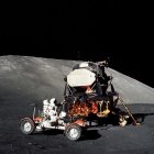 Lunar Module and Rover on Moon's Barren Surface