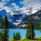 Scenic lakeside town with church spire, snowy mountains, and green trees