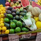 Colorful Fresh Fruits and Vegetables in Water Droplets Basket