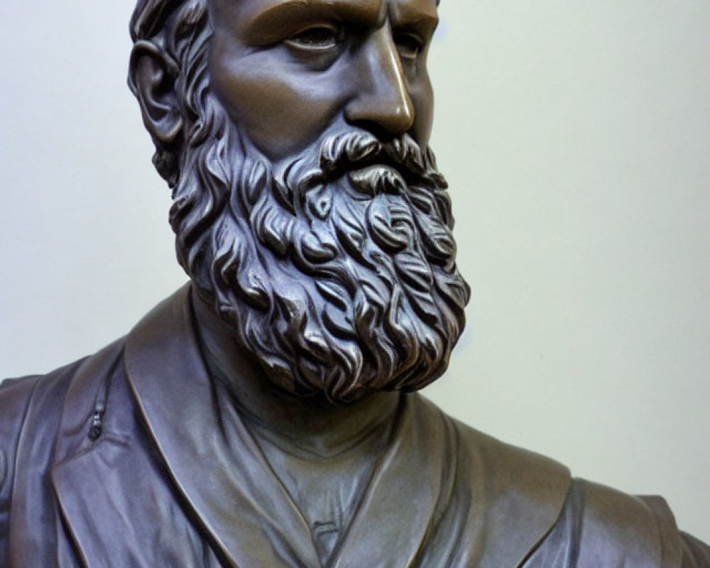 Classical style bust of bearded man with detailed hair on neutral background