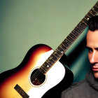 Man with Pompadour Beside Acoustic Guitar on Teal Gradient Background