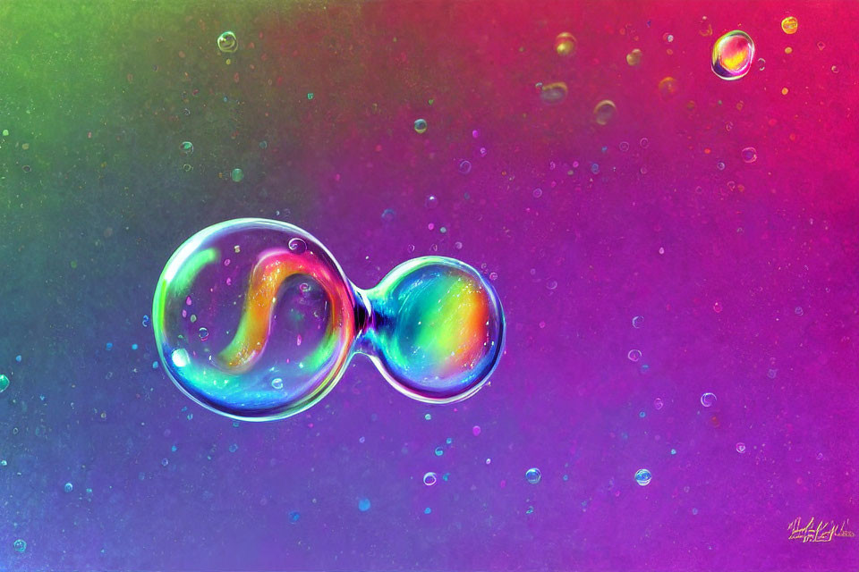 Iridescent soap bubbles on multicolored background with smaller bubbles