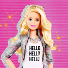 Elaborate Golden and Black Attired Doll with Blond Hair and Blue Eyes on Pink Striped Background